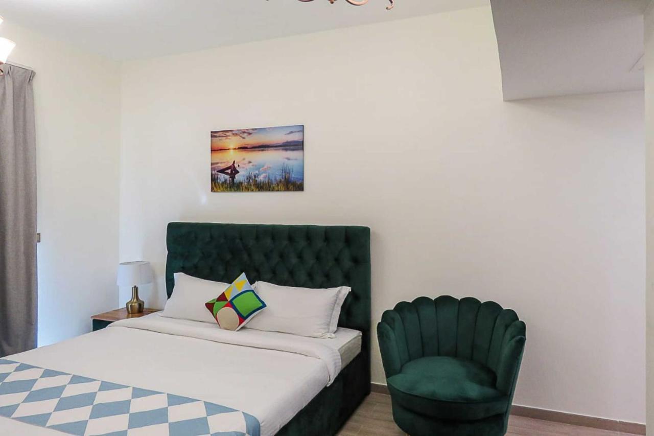 Oyo 860 Studio Apartment, Maya Tower 4, Jumeirah Village Triangle Dubai Exterior foto